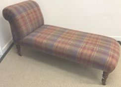 A day bed in the 19th Century taste with tartan upholstery,