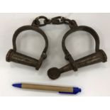 A pair of vintage style metal decorative handcuffs