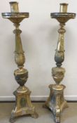A pair of 19th Century giltwood and gesso torchères, in the Italianate taste,