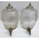 A pair of cut and frosted glass sherry barrels with side measuring gauge and plated tap, approx 33.