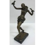 A modern bronze figure in the Art Deco style of a young woman dancing on a marble base,