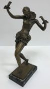 A modern bronze figure in the Art Deco style of a young woman dancing on a marble base,