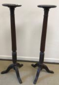A pair of mahogany jardiniere stands,