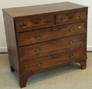 A 19th Century mahogany square front chest of two short over three long drawers with brass swan
