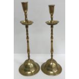 A pair of late 18th / early 19th Century bell metal travelling candlesticks,