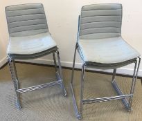 A set of six Arper counter stools, raised on chromed sled legs,