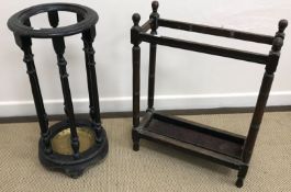 A Victorian ebonised stick stand of circular form, with turned and ringed supports,