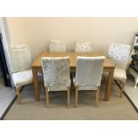 A set of six IKEA upholstered beech framed dining chairs and an oak veneered rectangular extending