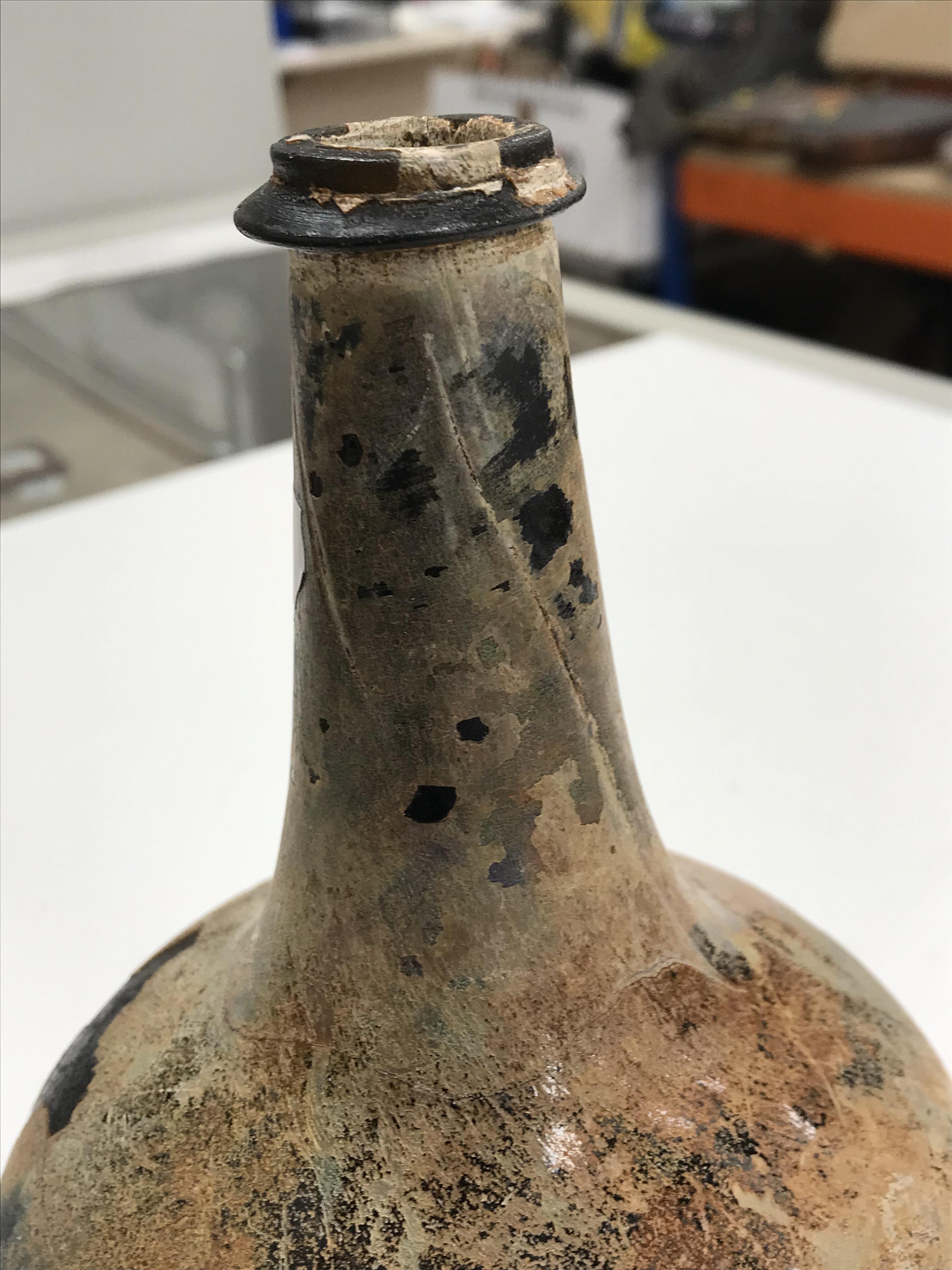 A mid 18th Century English black glass mallet-shaped wine bottle, - Image 6 of 33