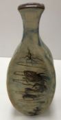 A late 19th Century Martin Brothers pottery vase with incised fish and seaweed decoration,