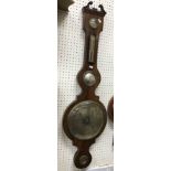 A Victorian rosewood cased banjo barometer thermometer with silvered dial 110cm length
