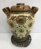 A circa 1900 Zsolany Pecs pottery wear vase oil lamp with matching glass based floral decorated