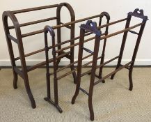 A collection of three late 19th / early 20th Century mahogany towel rails,