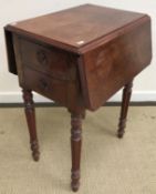 A Victorian mahogany drop-leaf Pembroke type work table with two drawers above work basket,