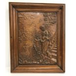 A circa 1900 wooden door panel decorated in relief with young lady and cat on steps,