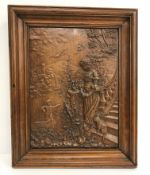 A circa 1900 wooden door panel decorated in relief with young lady and cat on steps,