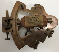 A modern brass sextant bearing inscribed "Kelvin & Hughes London 1917",