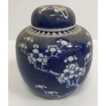 A Japanese eggshell part tea service together with two blue and white prunus decorated ginger jars