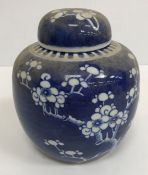 A Japanese eggshell part tea service together with two blue and white prunus decorated ginger jars