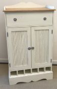 A collection of modern cream painted furniture comprising bookcase,