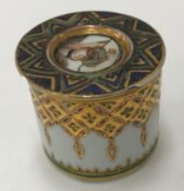 A 19th Century Chinese cylindrical pot with gilt and red, blue and green decoration,