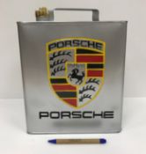 A modern rectangular petrol can inscribed "Porsche",