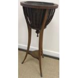A collection of furniture comprising an Edwardian mahogany nest of three occasional tables,