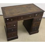 An Edwardian mahogany pedestal desk,