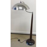 A modern telescopic reading / standard lamp with chromed domed lampshade,