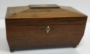 A 19th Century mahogany tea caddy of plain rectangular form,