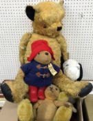 A collection of various early 20th Century and later soft toys / teddy bears including Sri Lankan