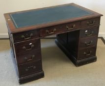 A mahogany double pedestal kneehole desk in the Georgian style,