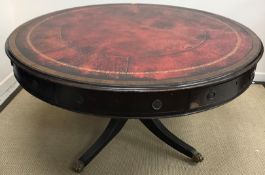 A Victorian mahogany and oak drum table, the plain top with leather insert and moulded edge,