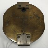 A modern brass colonometer compass, the brass outer case stamped "Brinton Compass", 8.5 cm wide x 4.
