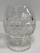 A collection of Waterford and other cut glass glassware to include wine glasses, brandy blooms, jug,