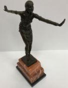 AFTER DIMITRI CHIPARUS "Art Deco dancer", a patinated bronze study on marble stepped base,