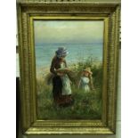 F KINNAIRD "Young girls collecting wild corn by the beach", oil on canvas, signed lower right,
