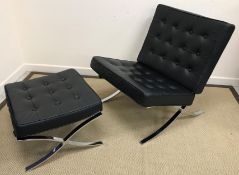 A "Barcelona" chrome framed button backed black leather upholstered chair after the original design