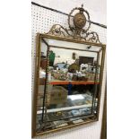 A 19th Century giltwood and gesso framed wall mirror in the George III style,