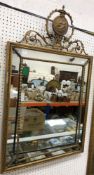 A 19th Century giltwood and gesso framed wall mirror in the George III style,