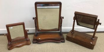 Two Victorian mahogany framed dressing mirrors, both with serpentine bases and rectangular plates,