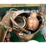 A selection of copper ware including coal helmet, kettle, coffee pot,