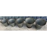 A collection of five various garden pail style buckets,