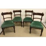 A set of four Victorian bar back dining chairs with green upholstered seats and stud style