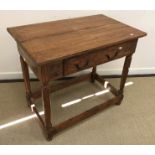 A walnut side table in the 18th Century style,