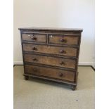 A 19th Century North Country oak and cross-banded chest,