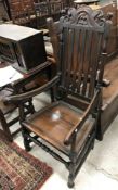 A circa 1700 style oak hall chair,