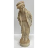 A carved alabaster figure of a young sailor, signed "E Battiglia (Eugenio)",