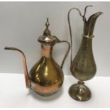 A 20th Century Middle Eastern engraved brass coffee pot of gourd form (formerly plated) 37 cm high