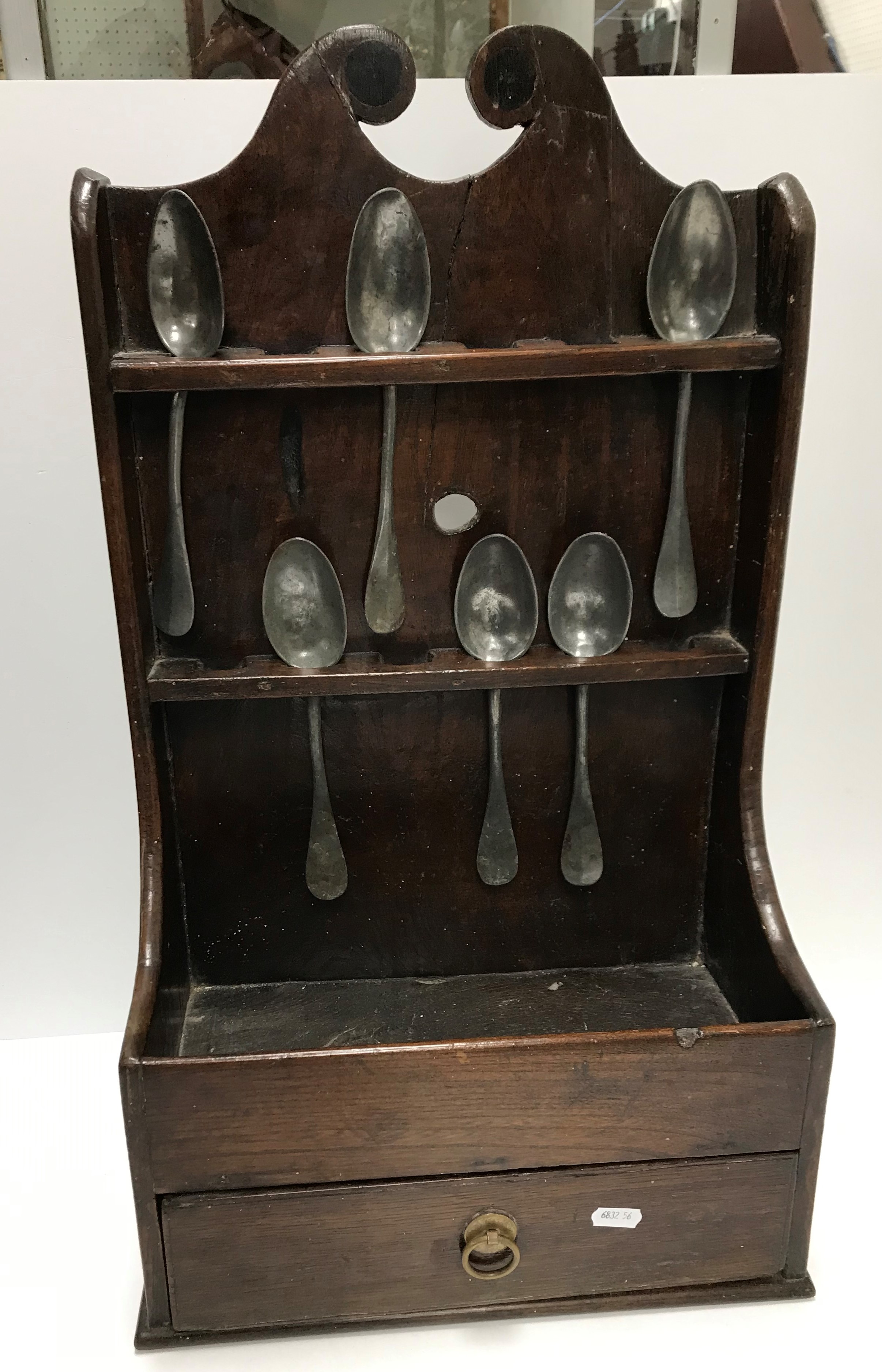 An 18th Century oak spoon rack,